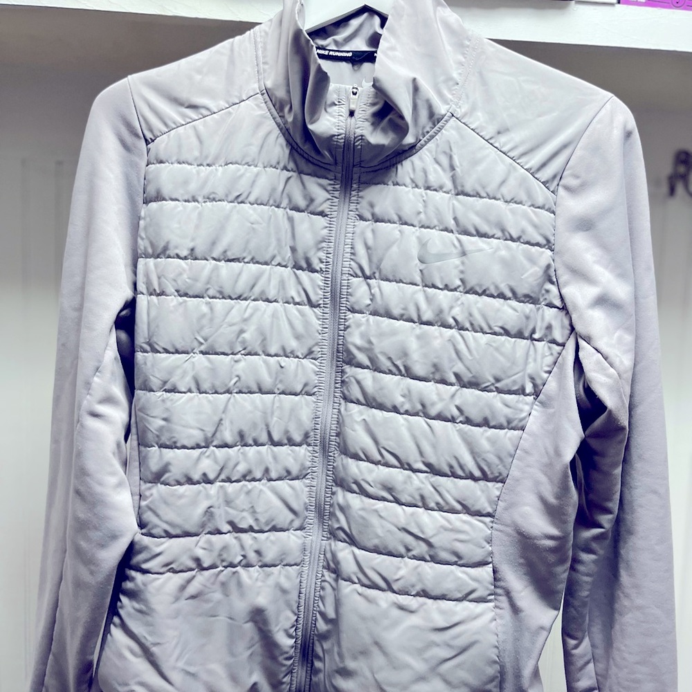 Athletic Nike lightweight jacket.